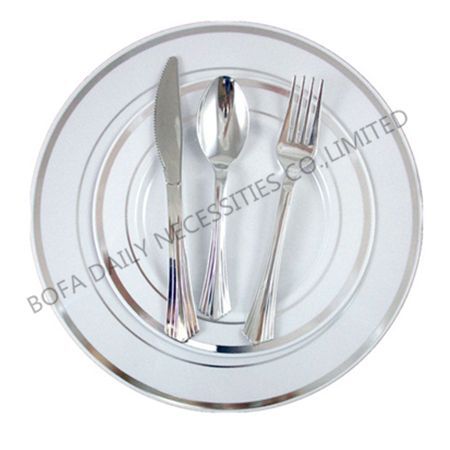 White plate with golden cutler...